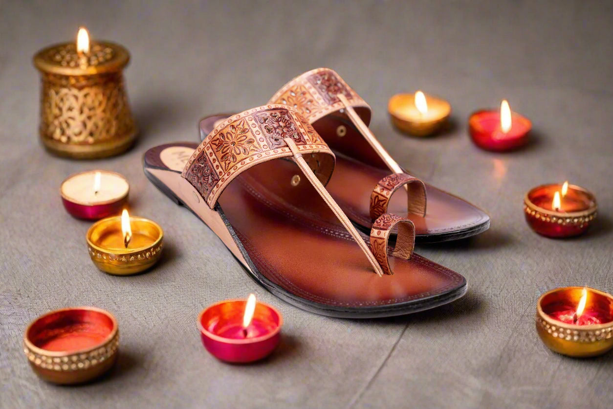 Women’s handcrafted tan leather Kolhapuri chappals with embossed floral design and toe ring