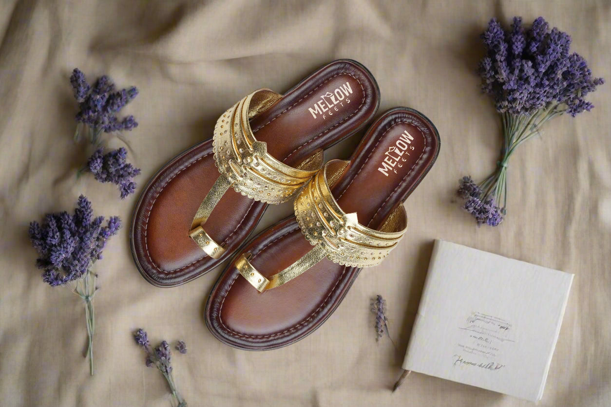 Golden Kolhapuri sandals with brown sole and stud detailing – top view