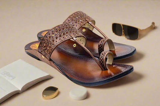 Brown sandal with decorative straps on a white background