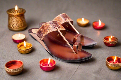 Women’s handcrafted tan leather Kolhapuri chappals with embossed floral design and toe ring