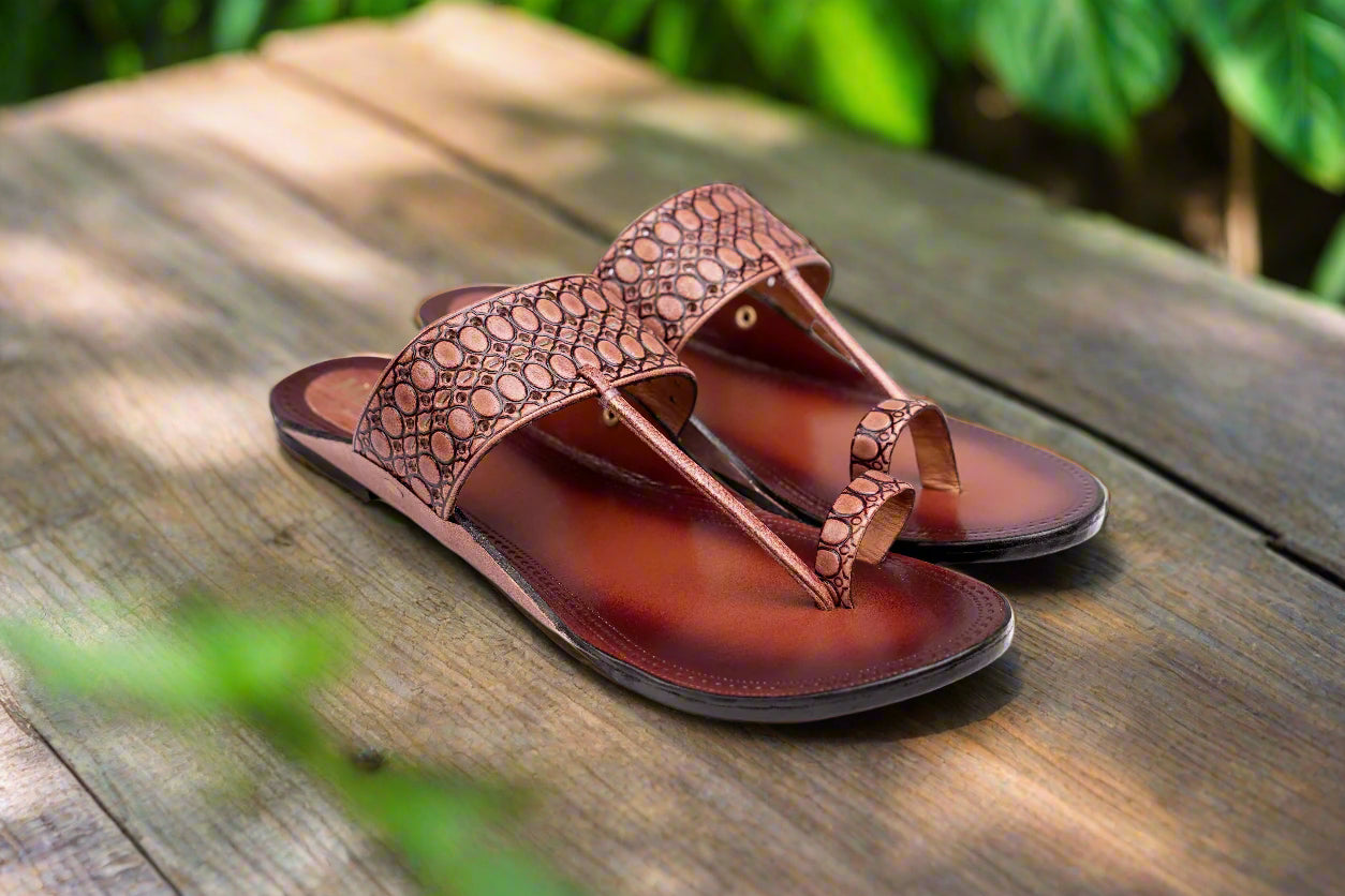 Women’s handcrafted tan leather Kolhapuri chappals with croc-textured pattern and toe loop