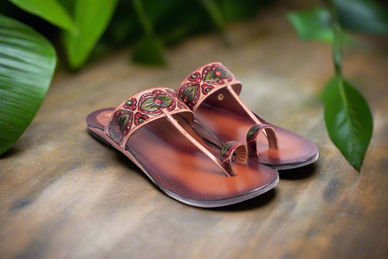 Women’s handcrafted leather Kolhapuri chappals with red and green heart-petal floral embossing
