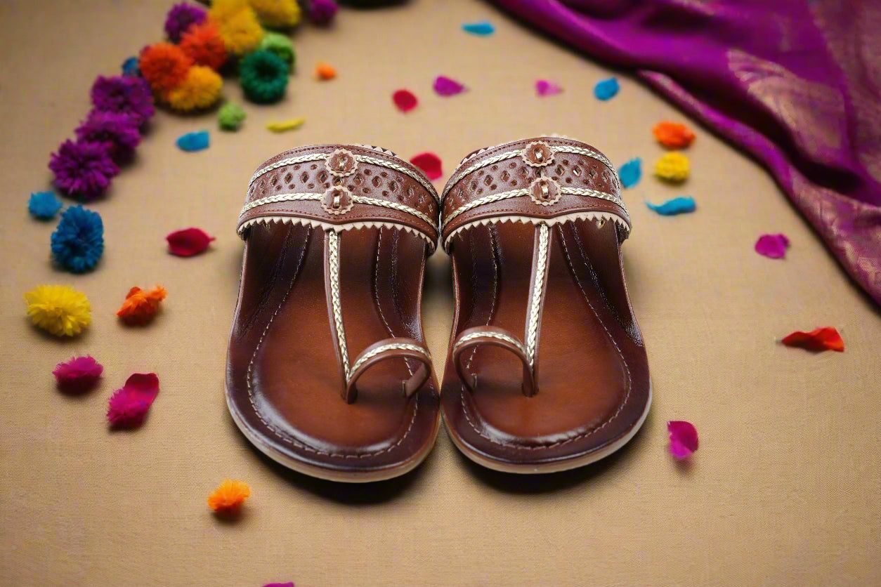 Traditional Indian leather flats in a soft neutral tone