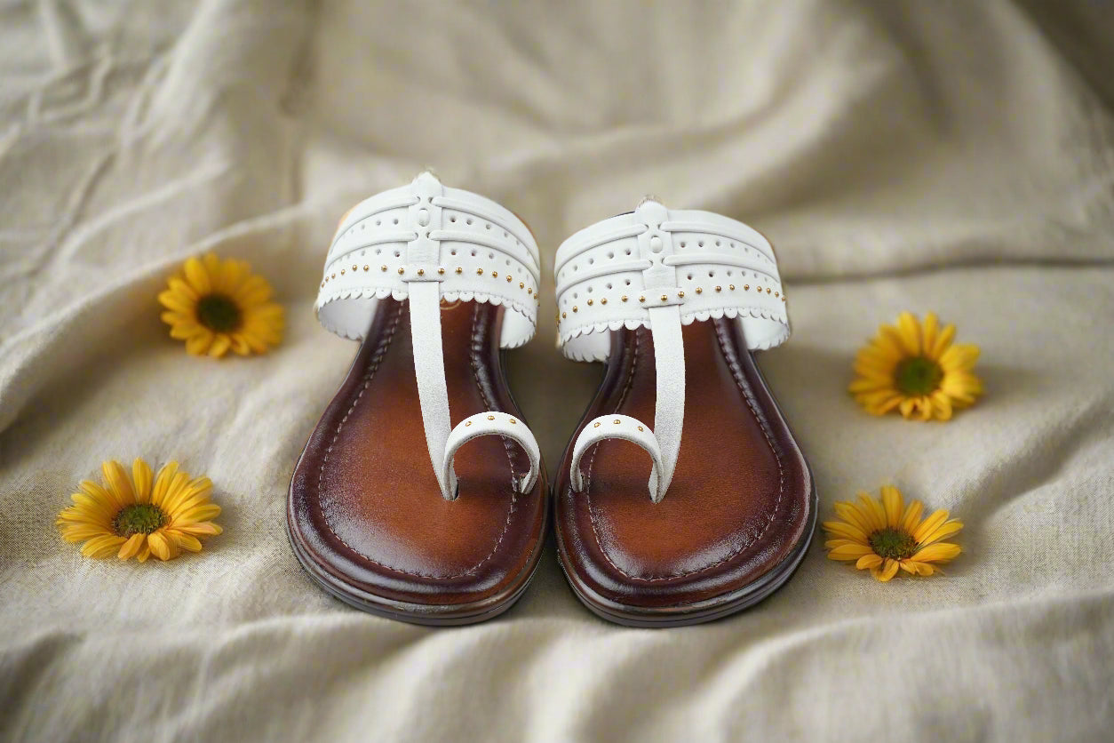 Handcrafted Mellow Feets women's white Kolhapuri sandals with intricate detailing and brown sole