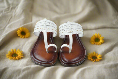 Handcrafted Mellow Feets women's white Kolhapuri sandals with intricate detailing and brown sole