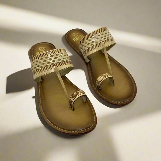 Beige handcrafted Kolhapuri sandals with lattice-cut leather strap and stitched toe loop, traditional ethnic flats by Mellow Feets