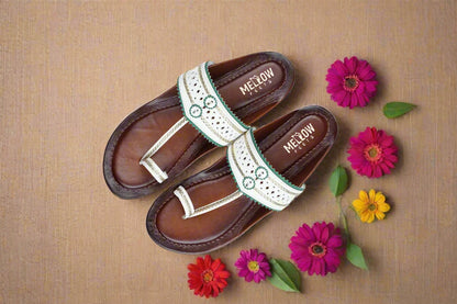 White and brown handcrafted leather Kolhapuri chappals – top view