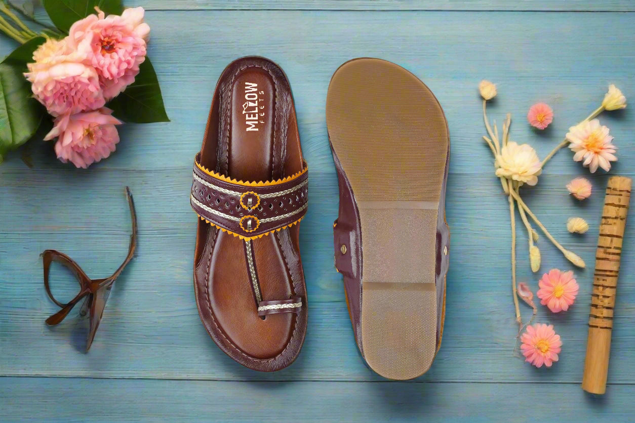 Handcrafted brown Kolhapuri sandals by Mellow Feets with yellow accents