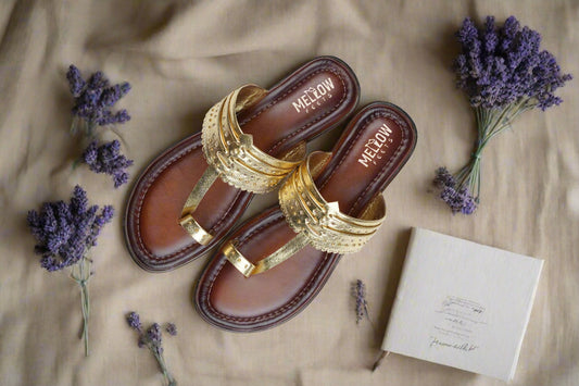 Golden Kolhapuri sandals with brown sole and stud detailing – top view