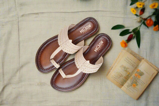 Beige Kolhapuri chappals with gold studs – top view