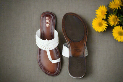 Elegant white ethnic leather flats with toe-loop design and cushioned sole from Mellow Feets